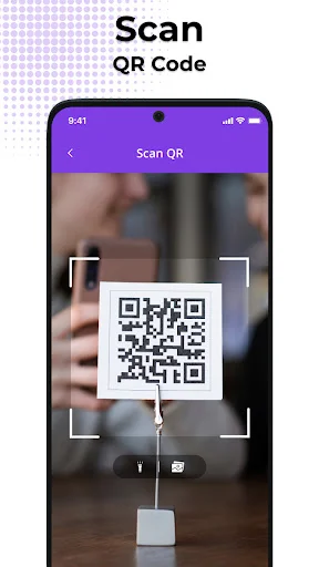 QR & Barcode Scanner app scanning QR code with camera viewfinder and focus frame on mobile screen