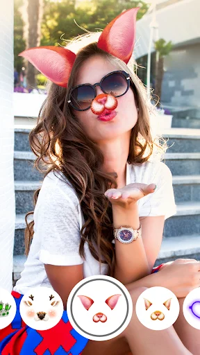 Face Live Camera app with bunny ears and nose filter applied, showing filter selection menu at bottom