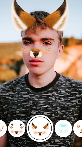 Face camera with fox ears and whiskers filter applied, showing animal face effects selection menu