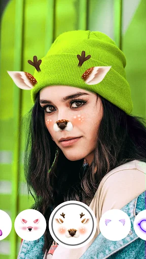Face filter camera with deer ears nose effect on green background, showing cute animal filters menu