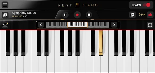 Piano app playing Symphony No. 40 with virtual keyboard, notes display, and learn mode toggle